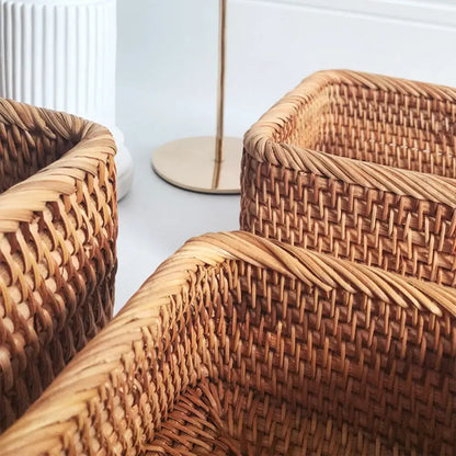 Close-up of hand-woven wicker storage baskets showcasing detailed craftsmanship and natural textures.