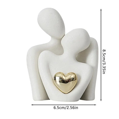 Decorative statue of a hugging couple with a golden heart, modern ceramic design, 8.5 cm tall, perfect for romantic home décor.