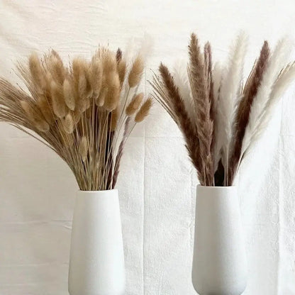 Natural dried pampas bouquet in white vases for elegant home decoration