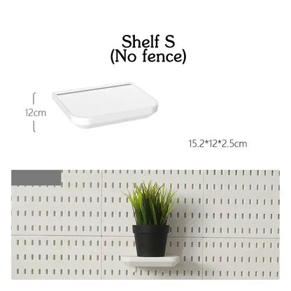 Wall-mounted storage panel with small white shelf holding a potted plant, dimensions indicated.