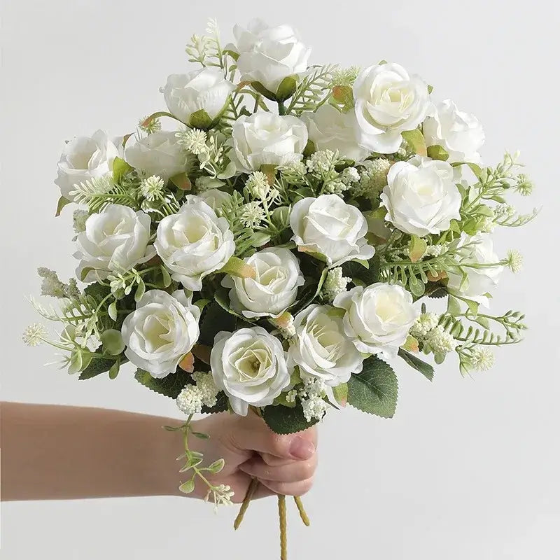 Artificial white silk rose bouquet for weddings and home decor, featuring realistic and durable high-quality silk flowers and greenery