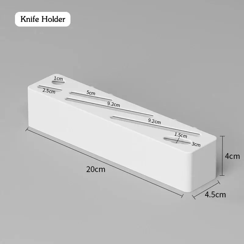 Wall-mounted knife holder with white plastic design and measurements for organizing kitchen spaces without drilling.