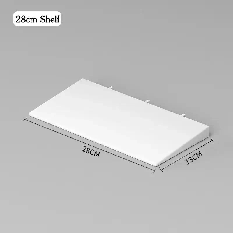 28cm white plastic wall-mounted shelf with dimensions 28cm by 13cm