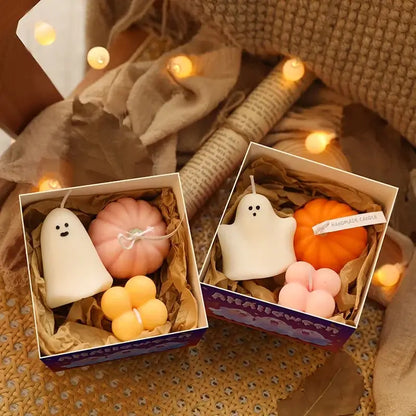 Aromatherapy Halloween candles in gift boxes, featuring pumpkin, ghost, and flower shapes for a festive and magical ambiance.