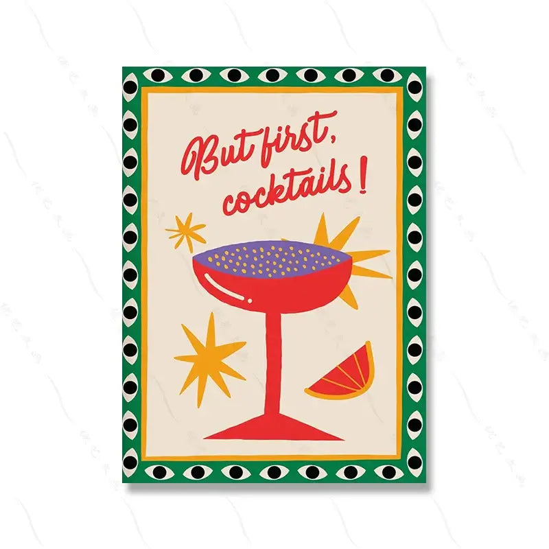 Decorative wall art print with a red cocktail glass and the text "But first, cocktails!" surrounded by eye pattern border